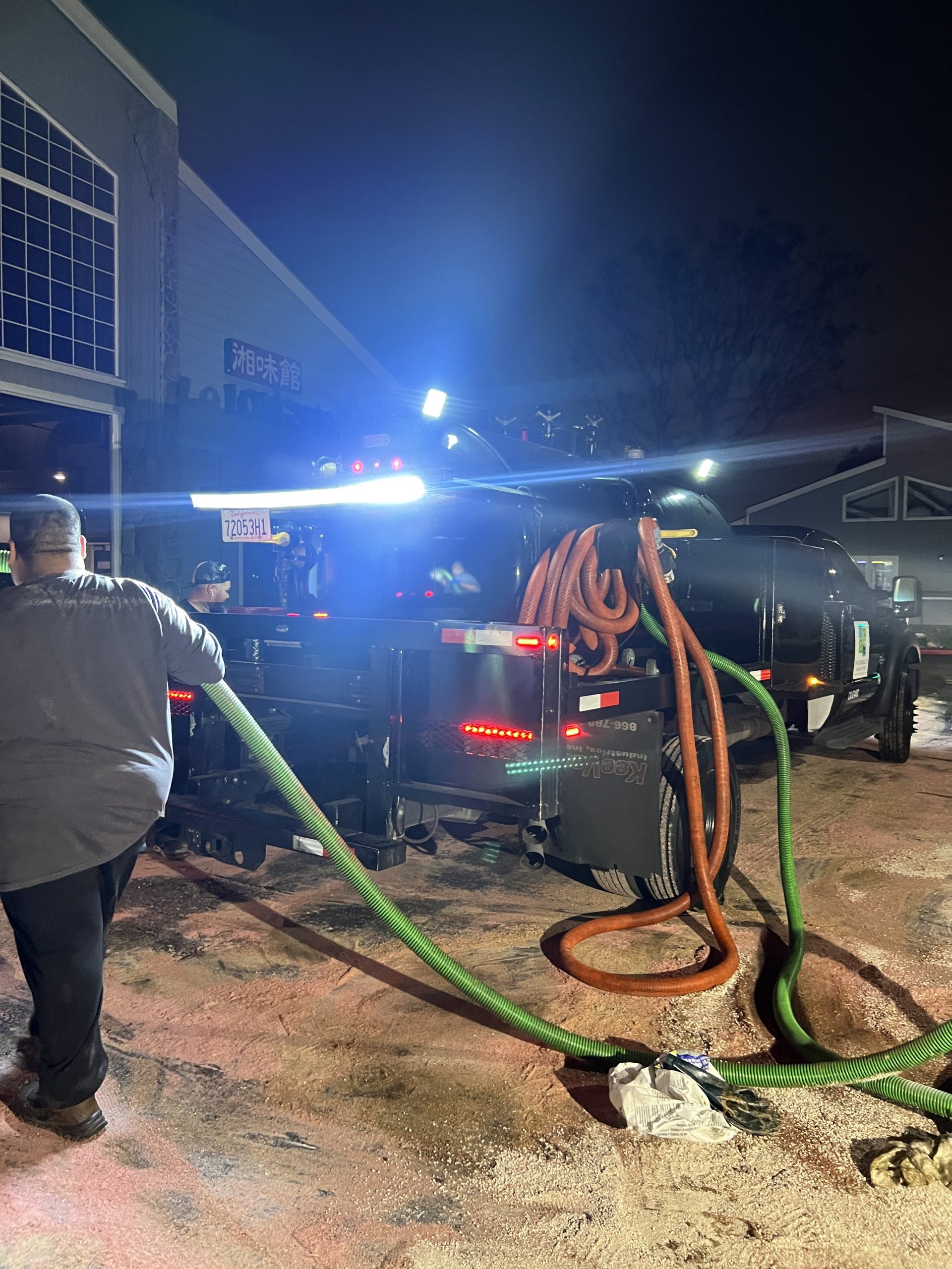 TGC experts performing grease trap cleaning in a La Puente restaurant