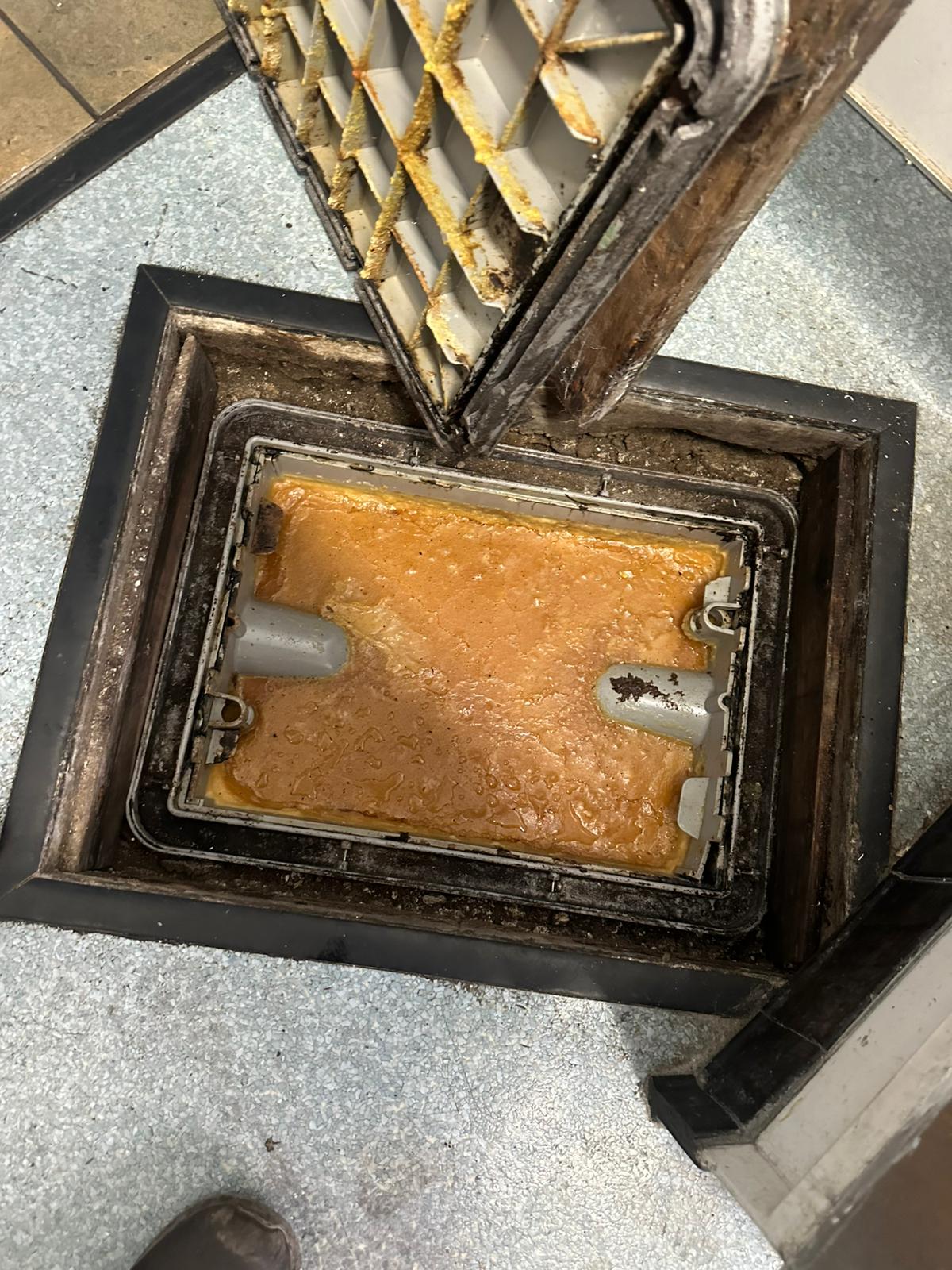 performing grease trap cleaning in a Huntington Park
