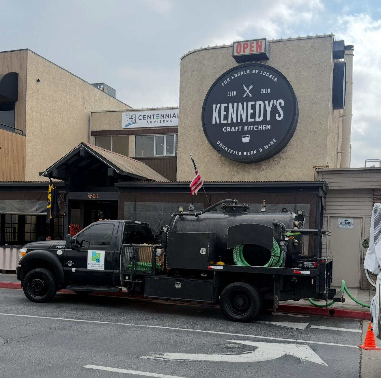 Licensed grease trap cleaning company truck in Irwindale industrial area